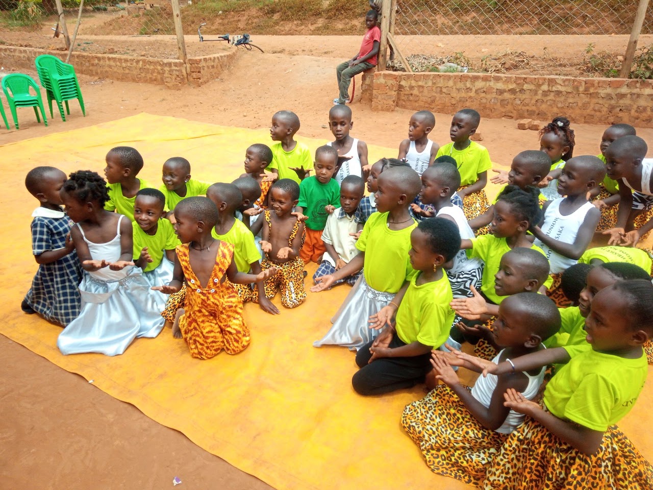 Children dancing outdoors during free time