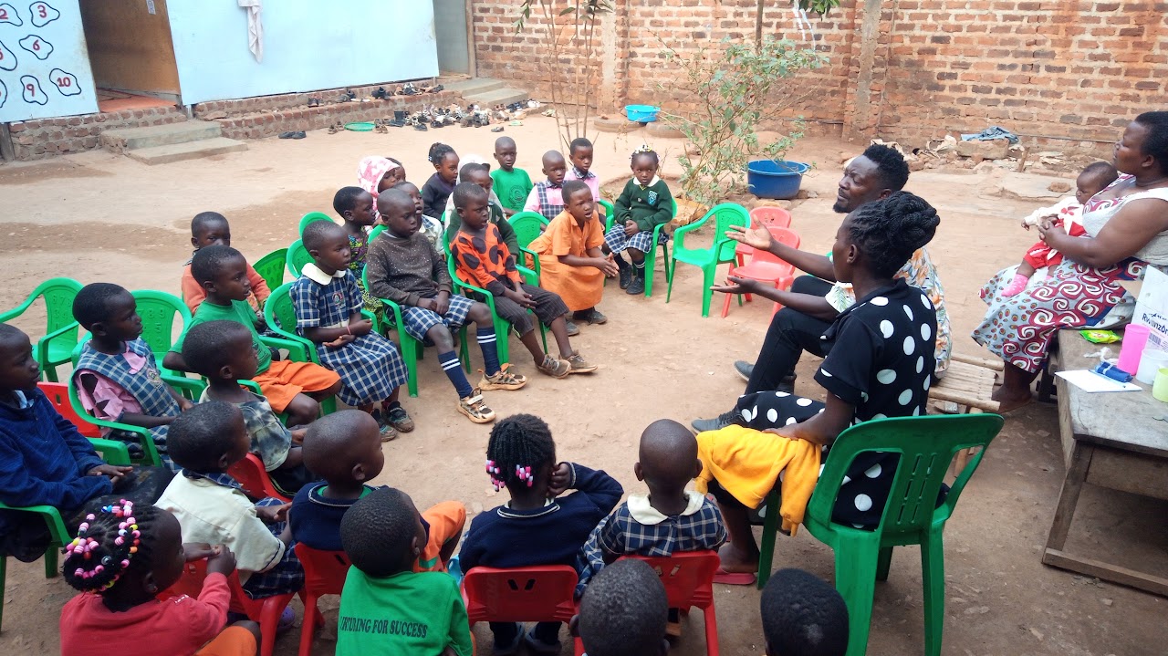 Teacher leading a class seated outside